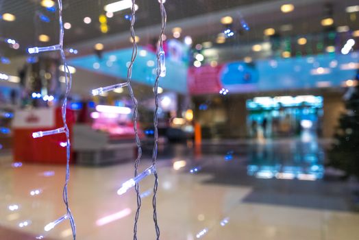 Shopping Mall Interior, Christmas Shopping Mall Defocused Background, Shopping Center, Abstract Blur Image of Shopping Mall and People on Christmas Time for Background