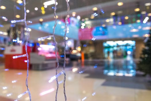 Shopping Mall Interior, Christmas Shopping Mall Defocused Background, Shopping Center, Abstract Blur Image of Shopping Mall and People on Christmas Time for Background