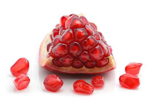 Closeup of pomegranate Seeds on a white background