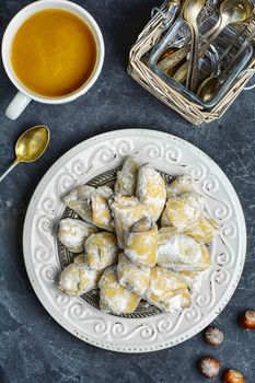 Homemade pastry stuffed with nuts in blue background