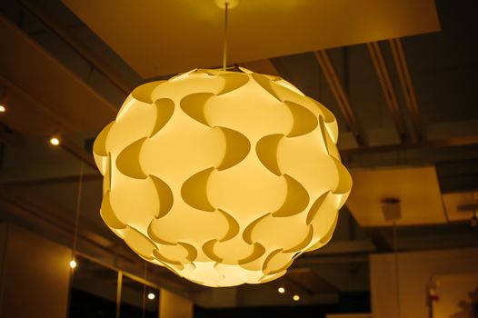 beautiful fabric chandelier in the Interior of the restaurant.