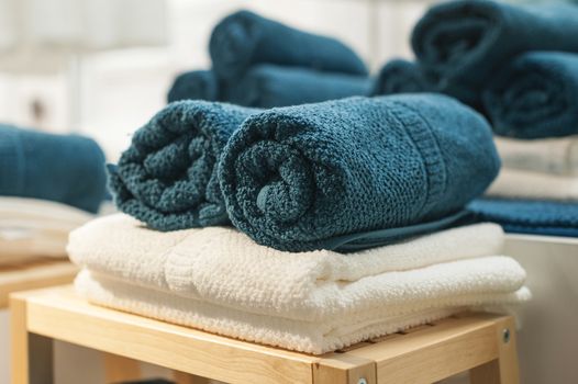 Terry towels on the chair in bathroom.