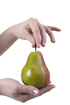 Female hand with pear on a white background