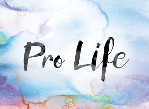 The word "Pro Life" painted in black ink over a colorful watercolor washed background concept and theme.