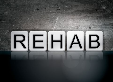 The word "Rehab" written in white tiles against a dark vintage grunge background.