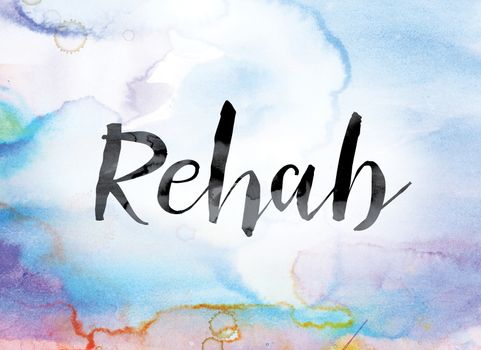 The word "Rehab" painted in black ink over a colorful watercolor washed background concept and theme.