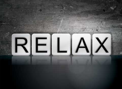 The word "Relax" written in white tiles against a dark vintage grunge background.