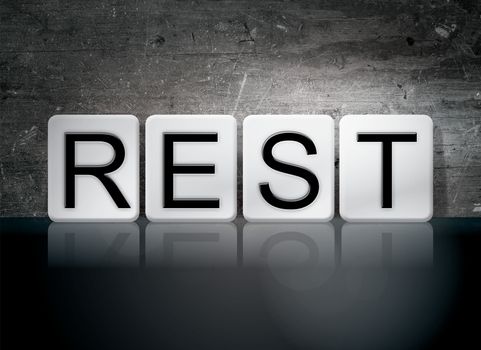 The word "Rest" written in white tiles against a dark vintage grunge background.