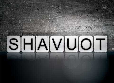 The word "Shavuot" written in white tiles against a dark vintage grunge background.