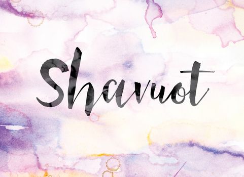 The word "Shavuot" painted in black ink over a colorful watercolor washed background concept and theme.