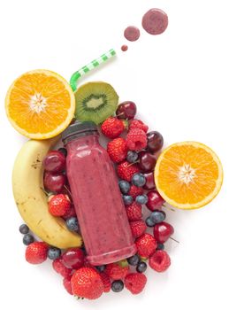 Berry smoothie with raspberries and blueberries over a white background 