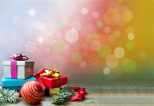 Christmas gifts and decorations with bokeh background space 