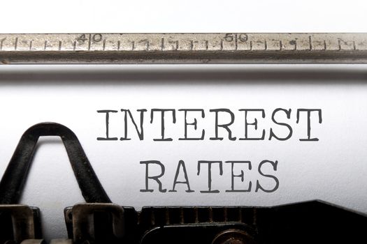 Interest rates headline printed on an old typewriter