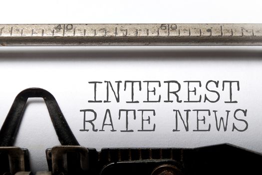 Interest rates headline printed on an old typewriter