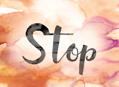 The word "Stop" painted in black ink over a colorful watercolor washed background concept and theme.