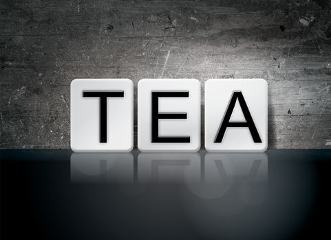 The word "Tea" written in white tiles against a dark vintage grunge background.