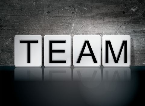 The word "Team" written in white tiles against a dark vintage grunge background.