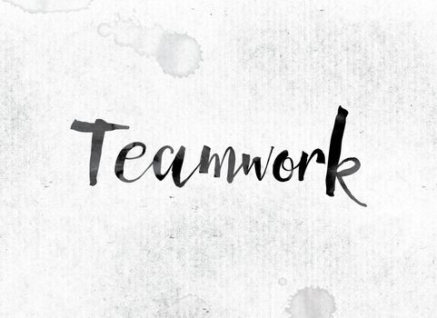 The word "Teamwork" concept and theme painted in watercolor ink on a white paper.
