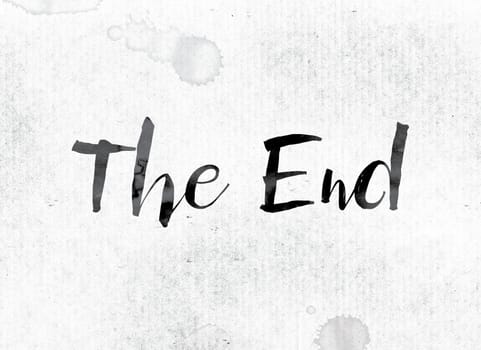 The word "The End" concept and theme painted in watercolor ink on a white paper.