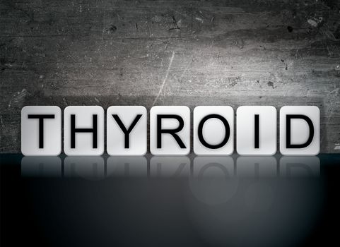 The word "Thyroid" written in white tiles against a dark vintage grunge background.