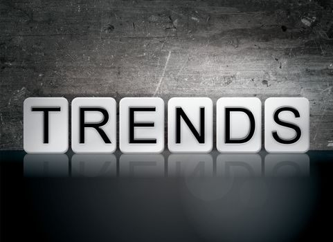 The word "Trends" written in white tiles against a dark vintage grunge background.