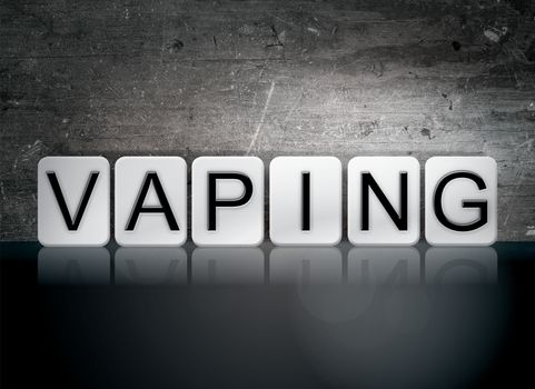 The word "Vaping" written in white tiles against a dark vintage grunge background.