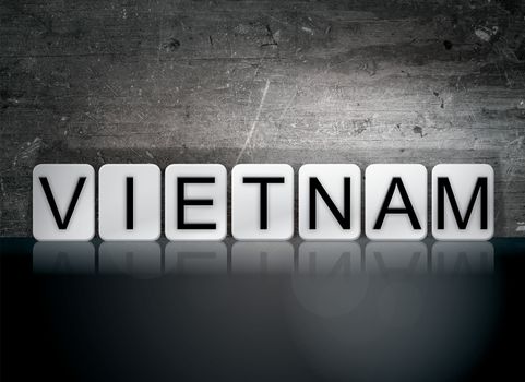 The word "Vietnam" written in white tiles against a dark vintage grunge background.
