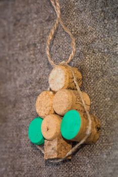 corks from wine are set out as a Christmas tree. Christmas toys