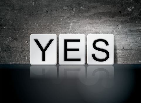 The word "Yes" written in white tiles against a dark vintage grunge background.