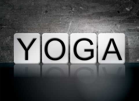 The word "Yoga" written in white tiles against a dark vintage grunge background.
