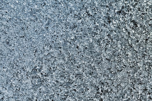 Block of blue smooth melting ice, close-up