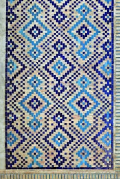 Old Eastern mosaic on the wall of a mosque, Uzbekistan