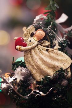 toy on the Christmas tree, Christmas angel. ornaments and symbols of Christmas