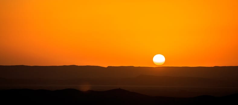 Beautiful sunset over the sand dunes in the Sahara desert, Morocco