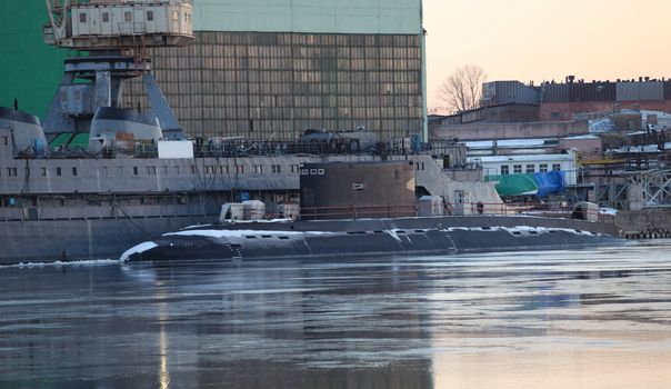 submarine moored to the pier