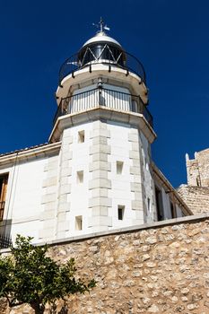 Lighthouse seen from below. Vertical image.