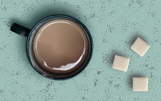 Cup of coffee on a blue wooden table