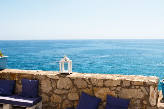 Restaurant with summer terrace and sea views. Horizontal image.