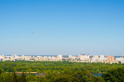 Helicopter flying above the Kiev city. Kiev is the capital of Ukraine