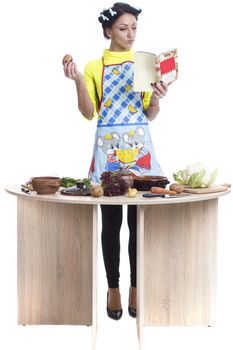 Housewife is preparing in the kitchen on a white background