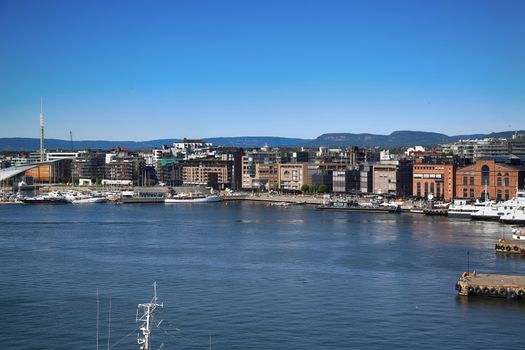 View on modern district Stranden, Aker Brygge district with lux apartments  and restaurants in Oslo, Norway 