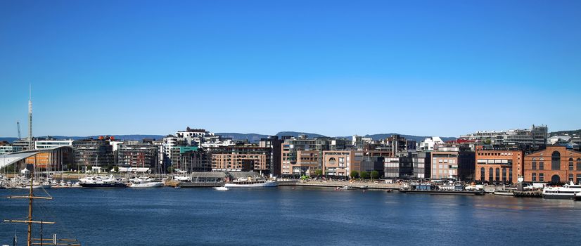 View on modern district Stranden, Aker Brygge district with lux apartments  and restaurants in Oslo, Norway 