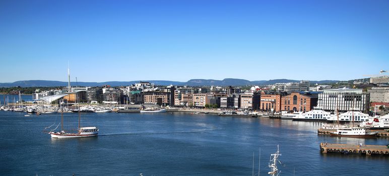 View on modern district Stranden, Aker Brygge district with lux apartments  and restaurants in Oslo, Norway 