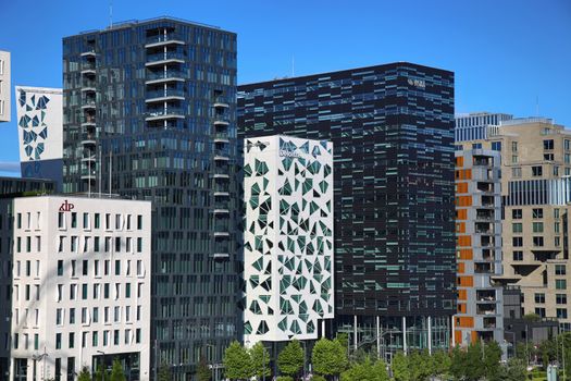 OSLO, NORWAY – AUGUST 17, 2016: View of The modern Oslo business district Bjorvika on Dronning Eufemias gate street. Modern architecture in in Oslo, Norway on August 17, 2016.
