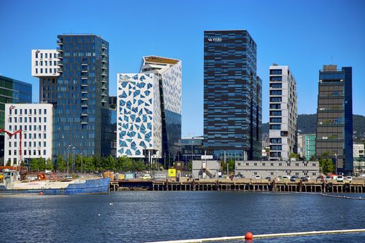 OSLO, NORWAY – AUGUST 17, 2016: View of The modern Oslo business district Bjorvika on Dronning Eufemias gate street. Modern architecture in in Oslo, Norway on August 17, 2016.