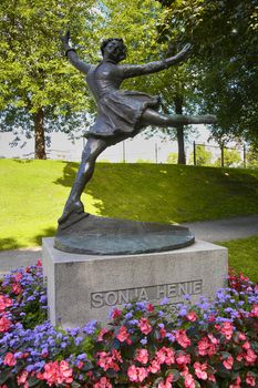 OSLO, NORWAY – AUGUST 18, 2016: Bronze statue of women skater Sonja Henie, she is Norwegian Olympic Ice Skating and Gold Medal Winner located on Vigeland Park in Oslo, Norway on August 18, 2016.