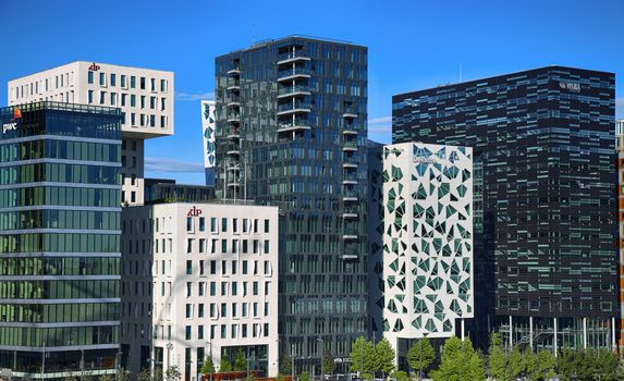 OSLO, NORWAY – AUGUST 17, 2016: View of The modern Oslo business district Bjorvika on Dronning Eufemias gate street. Modern architecture in in Oslo, Norway on August 17, 2016.