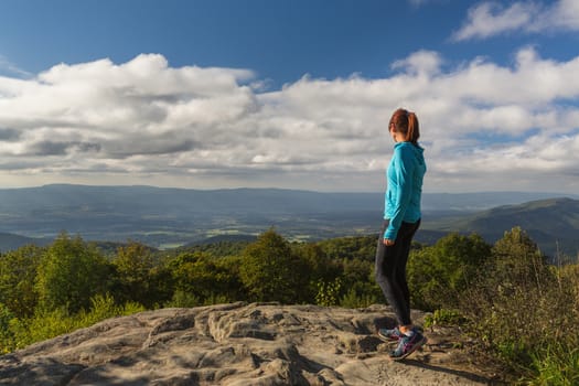 Taken from the Skyline Drive in the Shenandoah National Park, woman has this inspirational view across the valleys and mountains below