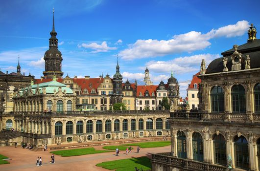 DRESDEN, GERMANY – AUGUST 13, 2016: Tourists walk and visit Dresdner Zwinger, rebuilt after the second world war, the palace is now the most visited monument  in Dresden, Germany on August 13, 2016.