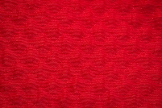 Rustic canvas fabric texture in red color.